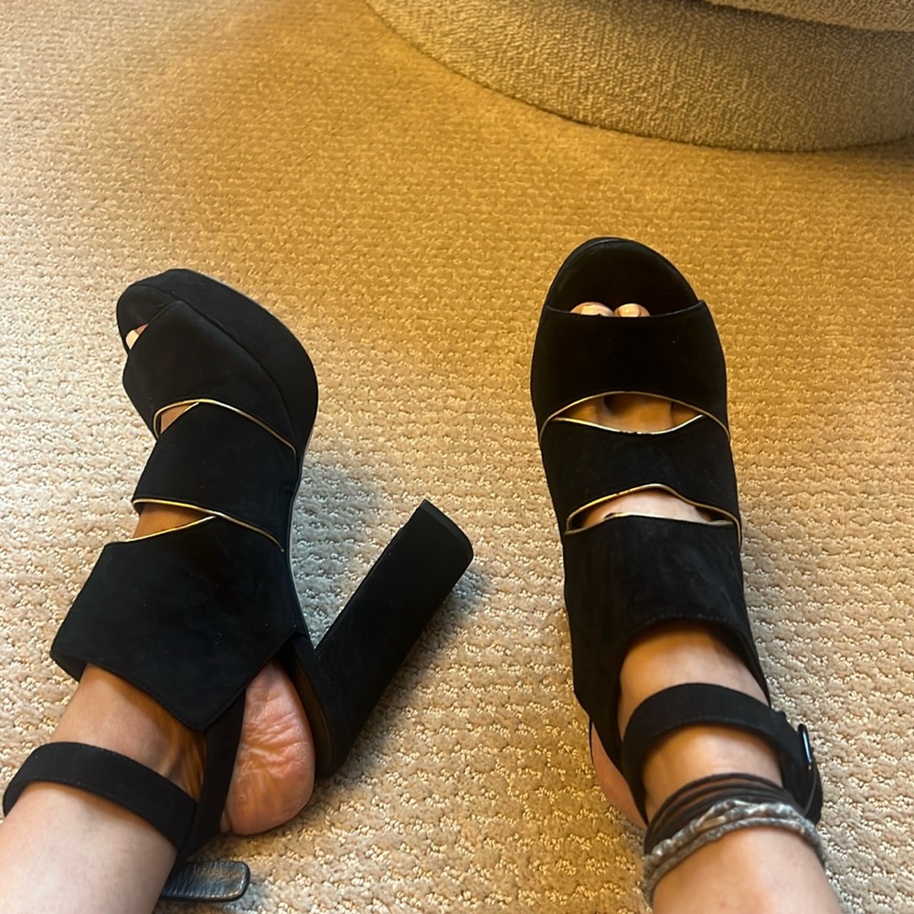 Black suede heels. By Stuart weitzman